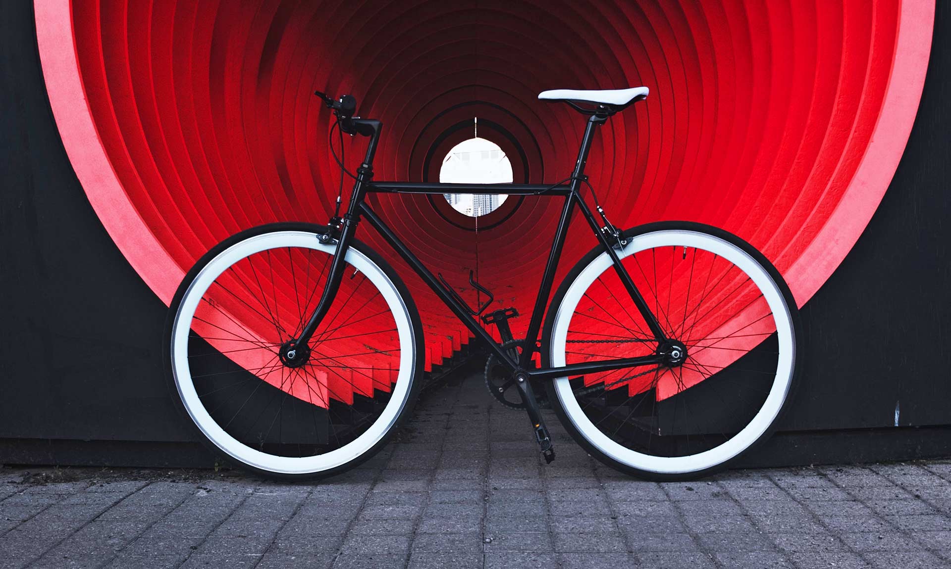 Bicycle In Front Of Red Tunnel