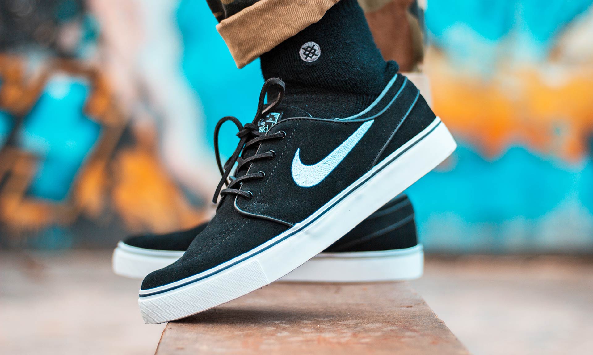 Person Standing On Skateboard