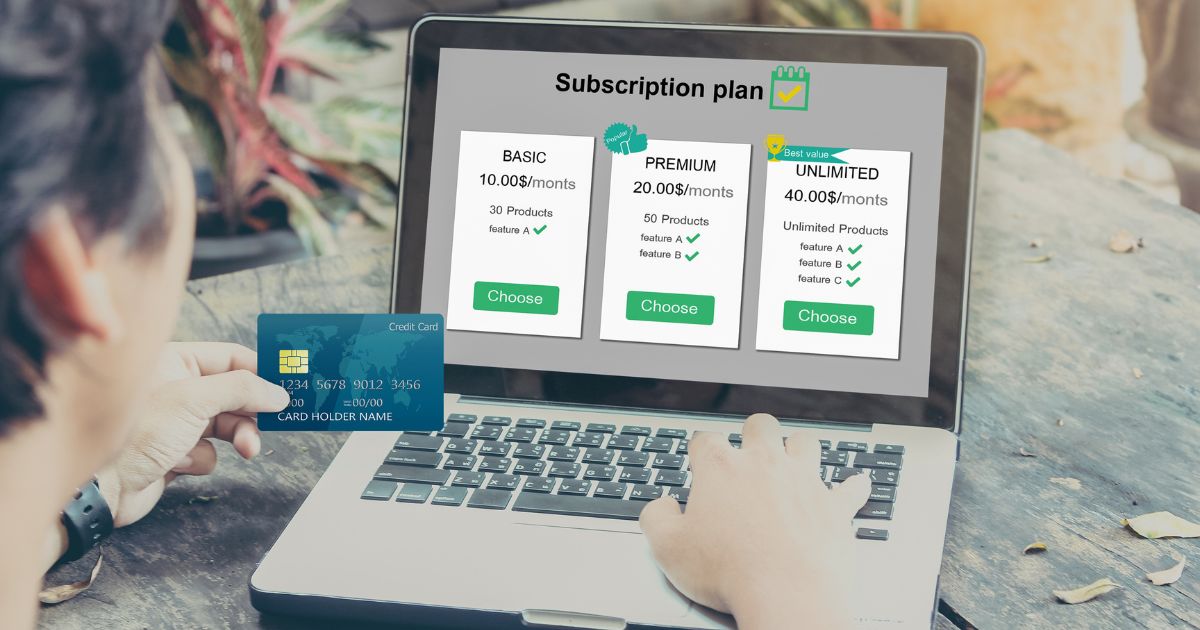 Subscription,business,model,concepts.man,hands,holding,credit,card,and,using